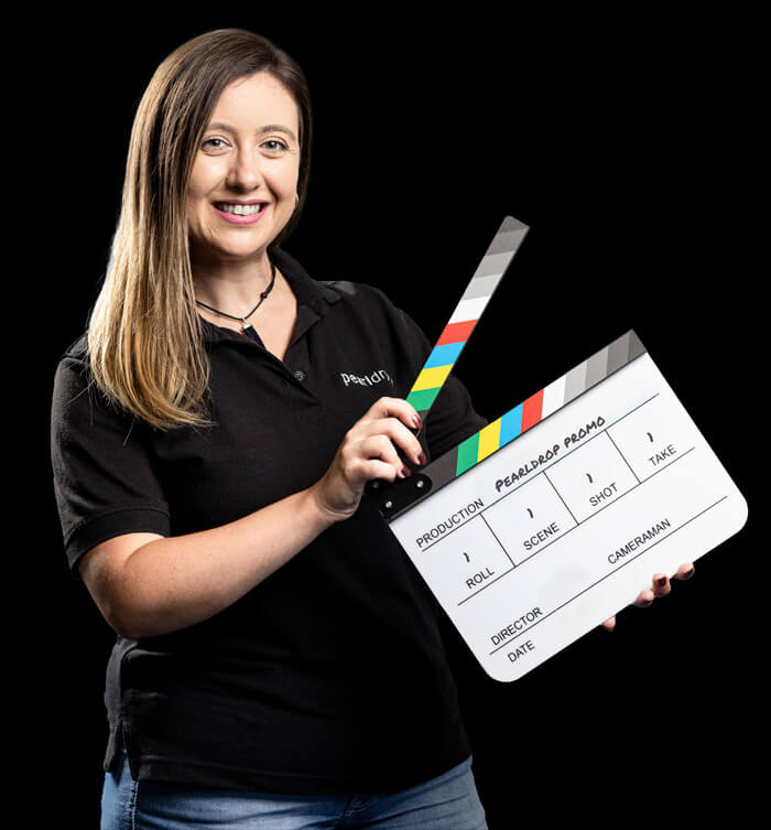 Katie with a clapperboard